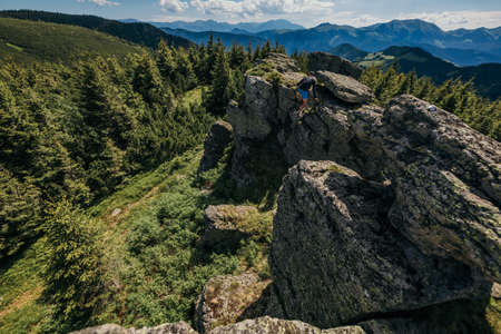 A canyon with a mountain in the backgroundの写真素材
