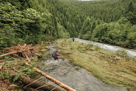 A close up of a hillside next to a body of waterの写真素材