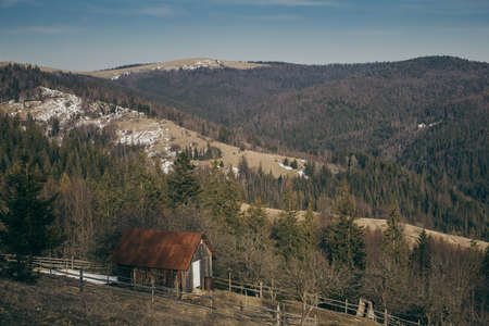 A house with a mountain in the backgroundの写真素材