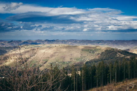 A canyon with a mountain in the backgroundの写真素材