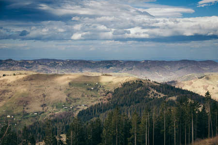 A canyon with a mountain in the backgroundの写真素材
