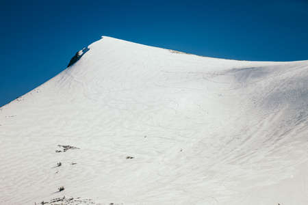 Snow in the mountains, thaw in spring and winterの写真素材