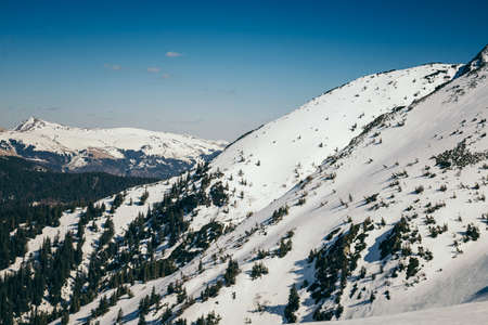 Snow in the mountains, thaw in spring and winterの写真素材