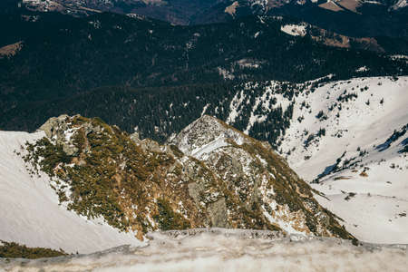 Snow in the mountains and blue sky, springの写真素材