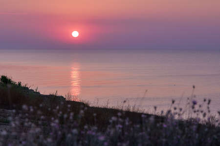 purple sunrise on seaの写真素材