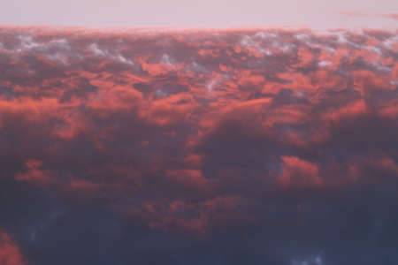 crimson sky at sunsetの写真素材