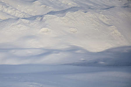 snow drifts in winter sunny day