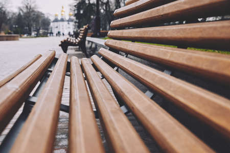 red brown benches on white backlit backgroundの写真素材