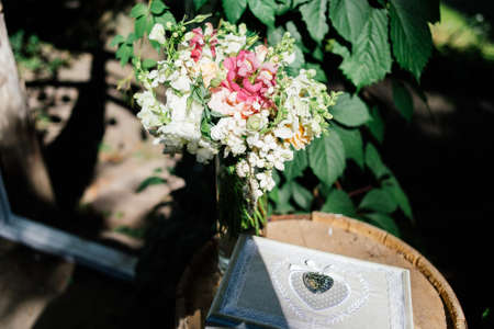 Wedding floral decorations in glass vaseの写真素材