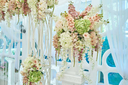 Beautiful flowers in vase on wedding ceremony, copy space. Wedding flowers. Wedding ceremony decorationsの写真素材