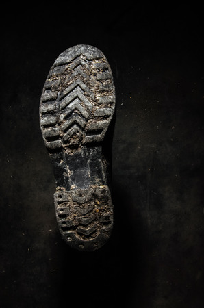 Shoe sole on a black background. Bottom view.の写真素材
