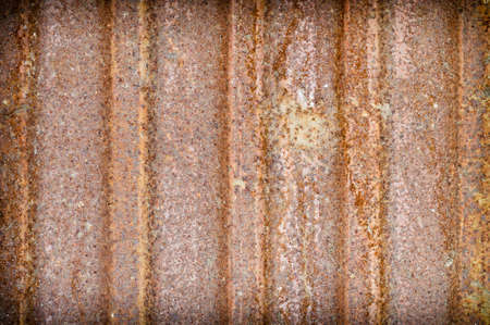 Rusty metal background. Background texture of old rusty metal sheet. Grunge background.