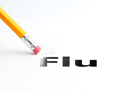 Closeup of pencil eraser and black flu text. Flu. Pencil with eraser.の写真素材