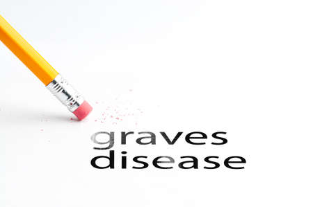 Closeup of pencil eraser and black graves disease text. Graves disease. Pencil with eraser.の写真素材