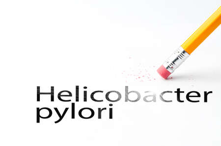 Closeup of pencil eraser and black helicobacter pylori text. Helicobacter pylori. Pencil with eraser.の写真素材