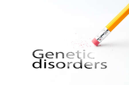 Closeup of pencil eraser and black genetic disorders text. Genetic disorders. Pencil with eraser.の写真素材