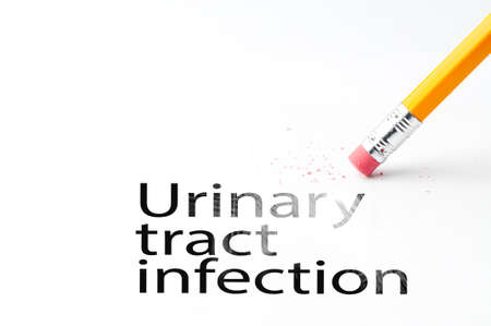 Closeup of pencil eraser and black urinary tract infection text. Urinary tract infection. Pencil with eraser.の写真素材