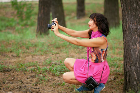 Beautiful girl listening to music on headphones. Young woman listening to musicの写真素材