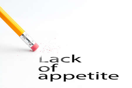 Closeup of pencil eraser and black lack of appetite text. Lack of appetite. Pencil with eraser.の写真素材