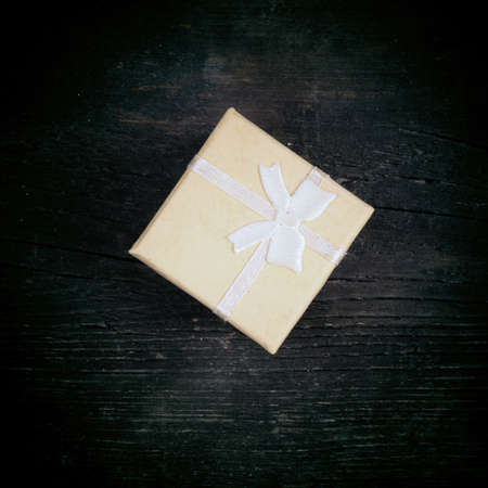 Boxes for gifts on old boards. Christmas background. Christmas decorations. New Year background. Xmax background. Holiday background. Toned image.の写真素材