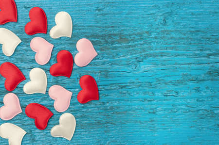 Valentine day. Red hearts on the blue boards. Valentine's Day. Red heart. Space for text. Eighth of...