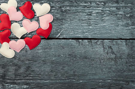 Valentine day. Red hearts on the darkboards. Valentine's Day. Red heart. Space for text. Eighth of March. International Women's Day. Toned image.の写真素材