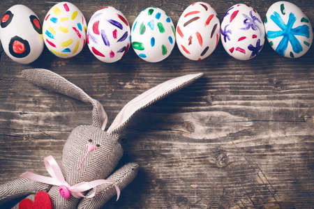 Easter bunny on old boardsの写真素材