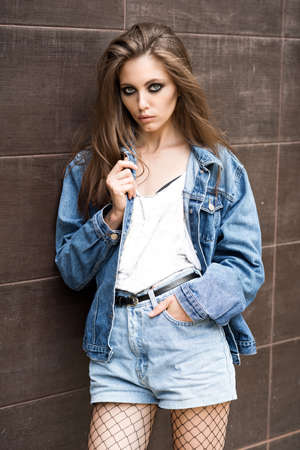 Beautiful brunette on the streetの写真素材