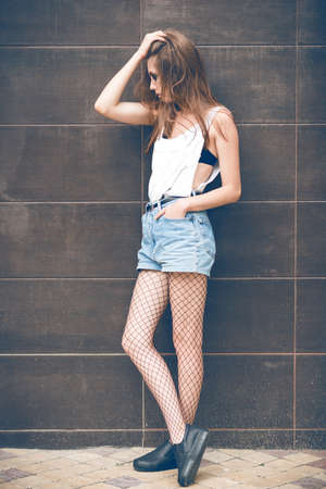 Beautiful brunette on the streetの写真素材