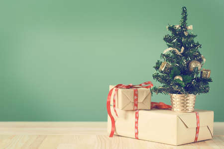 Festive Christmas tree stands on light boards. Christmas background. Christmas decorations on a...