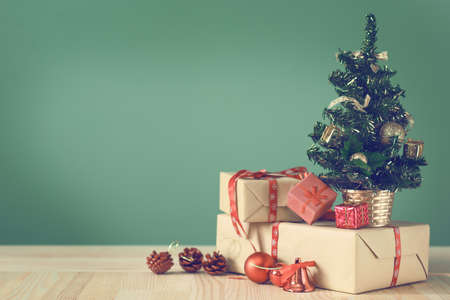 Festive Christmas tree stands on light boards. Christmas background. Christmas decorations on a...