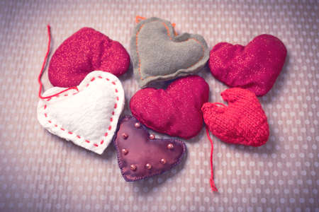 Colorful knitted heartsの写真素材