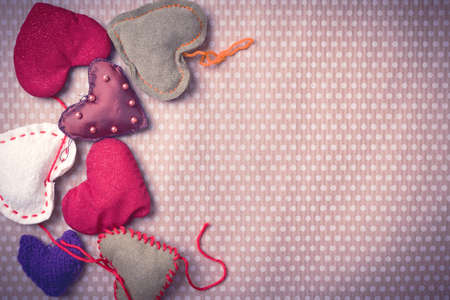 Colorful knitted heartsの写真素材