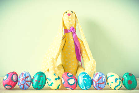 Easter bunnies on a green backgroundの写真素材
