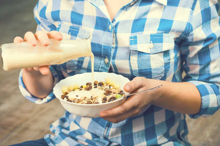 The girl a plate of muesli