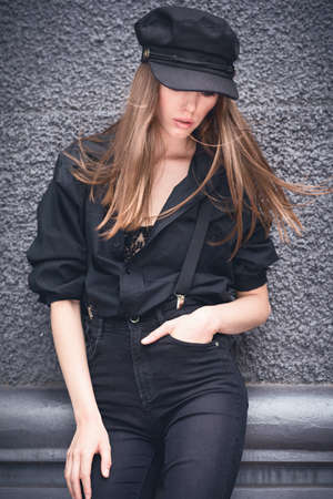 Beautiful girl in a cap.の写真素材