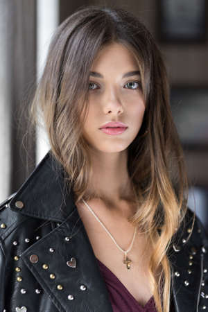 Photo of a beautiful girl in the interior of the restaurant