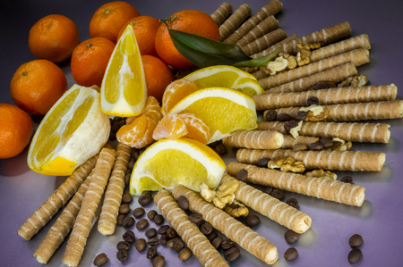 Sweet dessert with fruits and biscuits, coffee beansの写真素材
