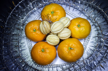 New Year's toys, fruit and cookiesの写真素材