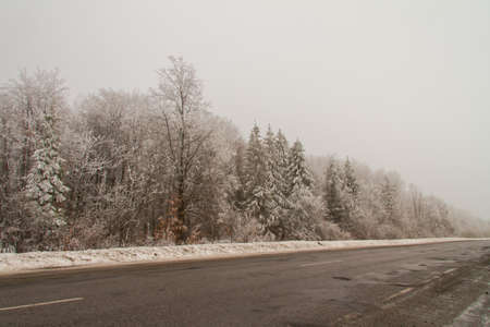 The road from Colomiy to Tismenitsa in Ivano-Frankivsk region of Ukraine. February 2013の写真素材