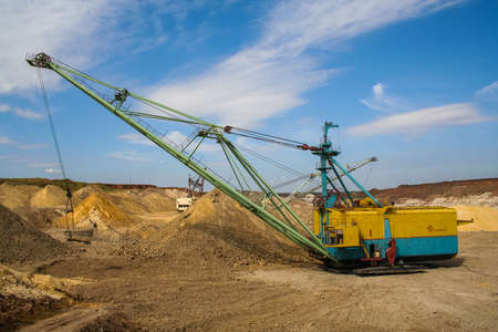 Walking excavator - dragline ESH 13/50 (bucket capacity of 13 cubic meters, boom length of 50 meters). Kaolin quarry near the town of Pology in the Zaporizhya region of Ukraine. September 2005のeditorial素材