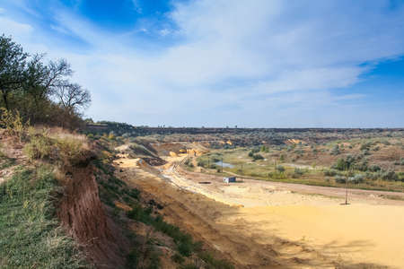 Sand quarry near the town of Orikhiv in Zaporizhzhia region of Ukraine. Excavator caterpillar electric power shovel EKG "4,6, with bucket capacity of five cubic meters. September 2006の写真素材