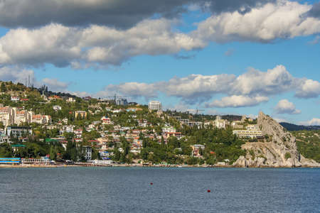 View of the village of Gurzuf with Adalar rocks with cliffs and Bear mountain(big Yalta, Crimea, Ukraine). September 2007の写真素材
