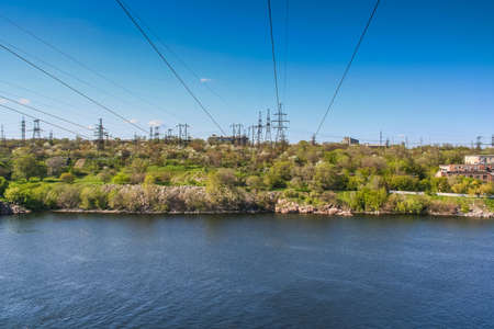 Electricity transmission line from the DNIPRO HYDROELECTRIC STATION on the island of Khortytsya. Zaporozhye , Ukrane. April 2008の写真素材
