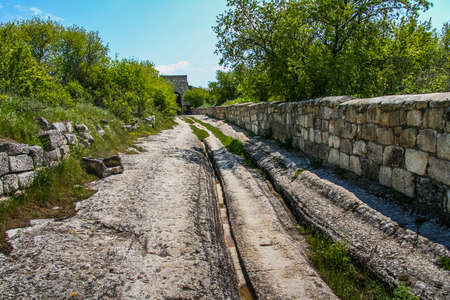 Chufut-Kale, formerly Kirk-Or (Judean Fortress) is a medieval fortress town in the mountainous region of the Crimea, 3 km east of Bakhchisaray, now in ruins. Crimea, Ukraine. May 2009の写真素材