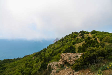 The vicinities of the Mangush Plateau (Baba-kaya Mountain) near the village of Khodja Sala of Bakhchisaraysky District. Crimea, Ukraine. MAY 2009の写真素材