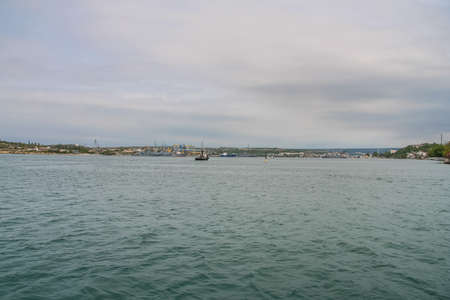 Tug in the ship's bay of Sevastopol. Crimea, Ukraine. May 2009の写真素材