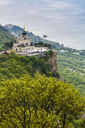 Church of the Resurrection of Christ - Orthodox church over the village of Foros, built in 1892 on a steep cliff - the Red Rock. The height of the building above sea level is 412 meters. Krym, Ukraine. May 2009のeditorial素材