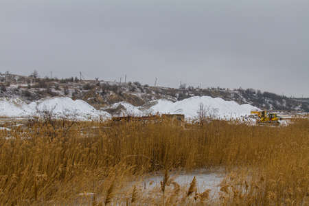 Snow-covered winter clay quarry in the Zaporozhye region of Ukraine. February 2018の写真素材