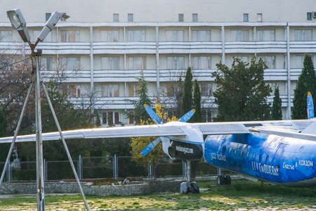 An old passenger airplane AN-24 on the territory of the Blue Bay boarding house in the village...